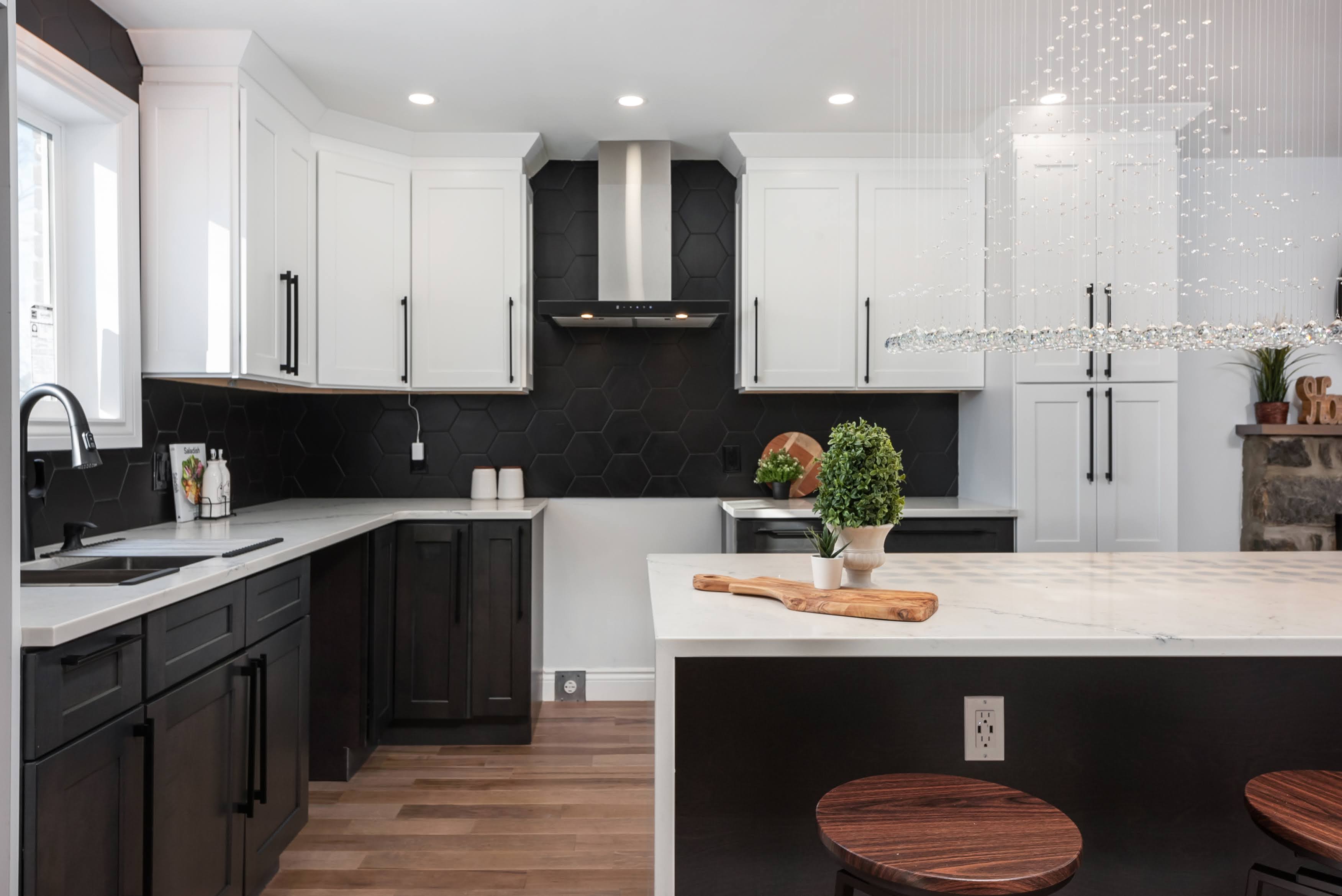 Modern kitchen renovation in Beaconsfield with black backsplash